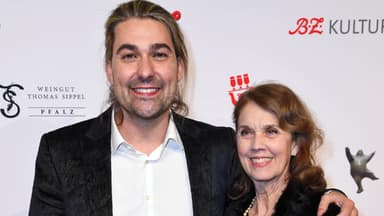 David Garrett posiert mit Mutter auf rotem Teppich