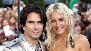 Marc Terenzi und Sarah Connor posieren, Menschen im Hintergrund