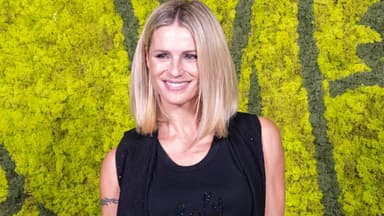 Michelle Hunziker im Jahr 2023 vor einer grünen Wand