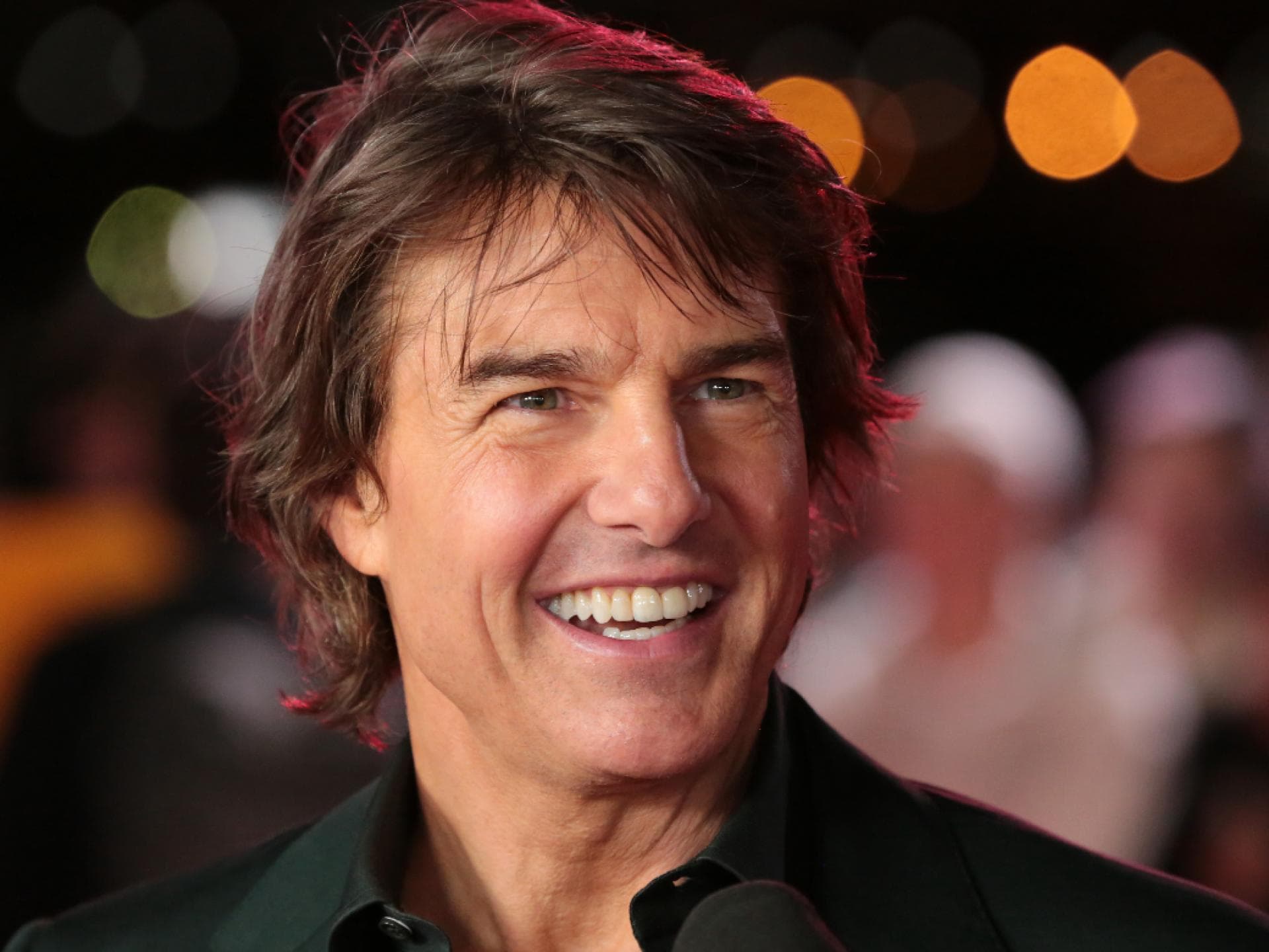 Tom Cruise lacht